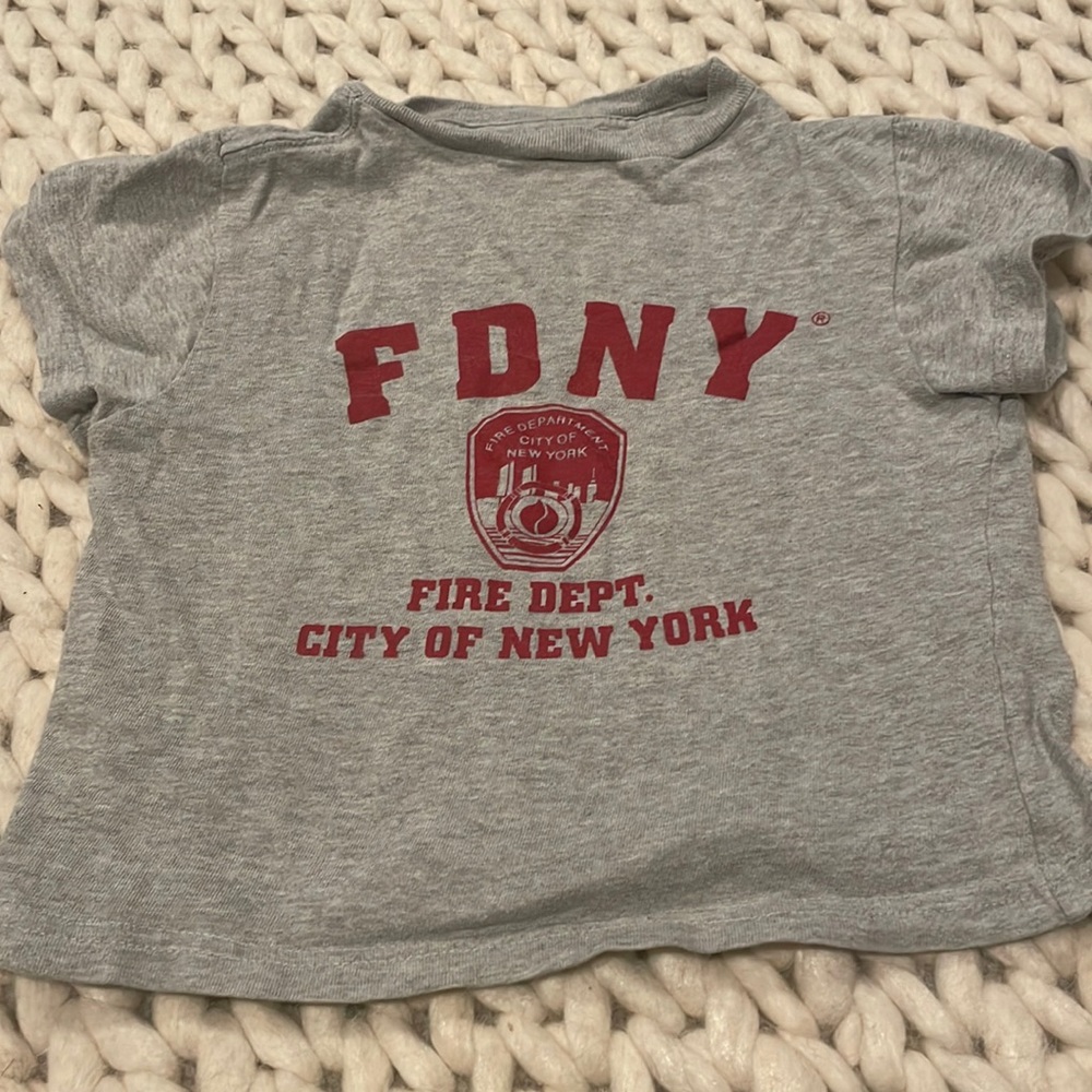 FDNY T-shirt size says extra small 2/ 4